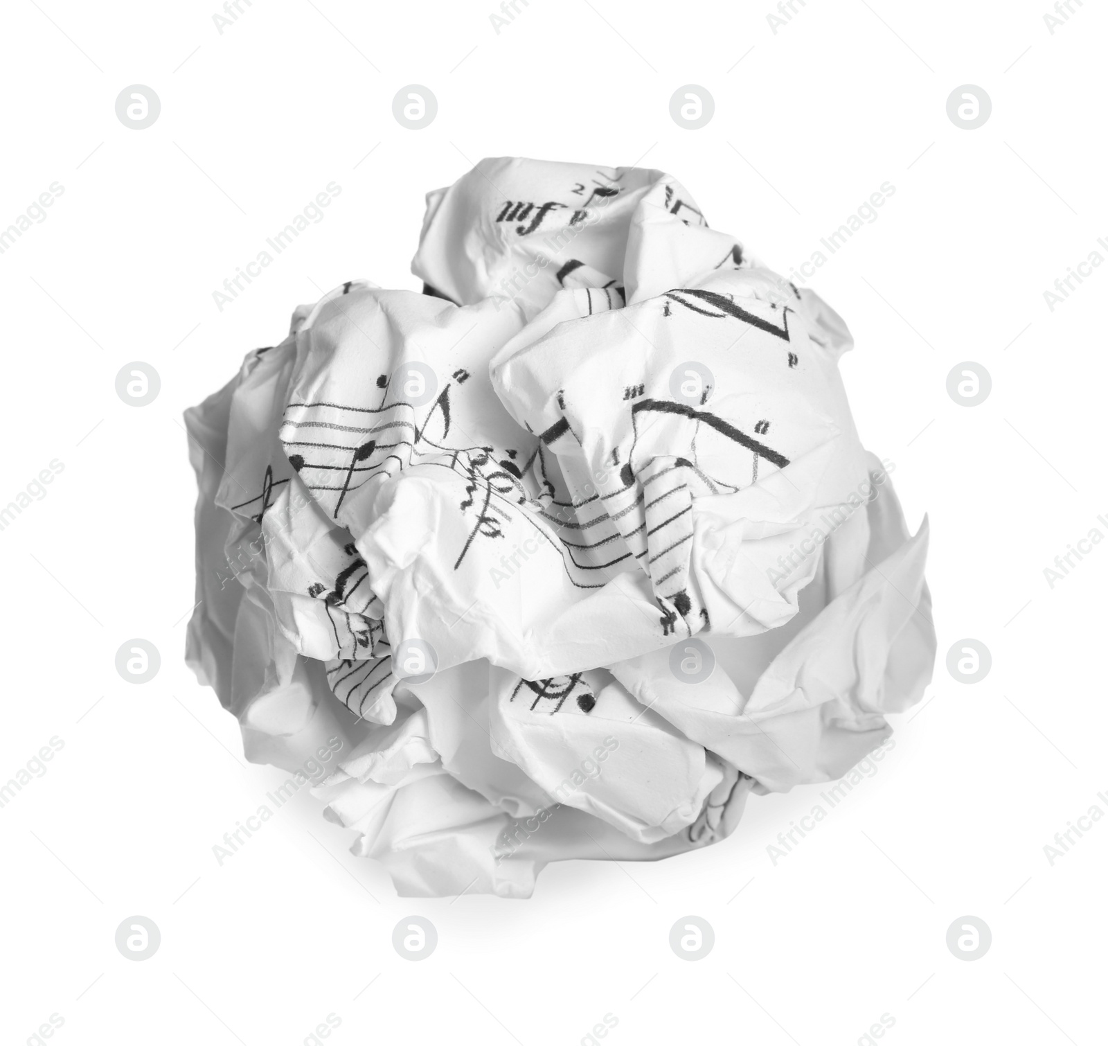 Photo of Crumpled sheet of paper with musical notes isolated on white