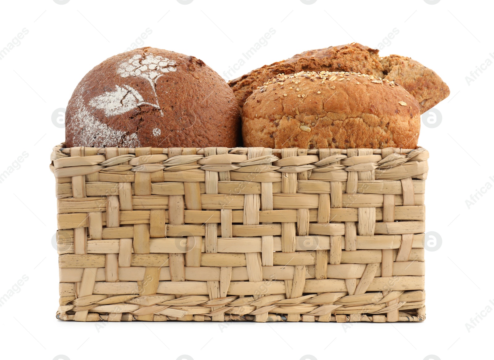 Photo of Basket with different types of fresh bread isolated on white
