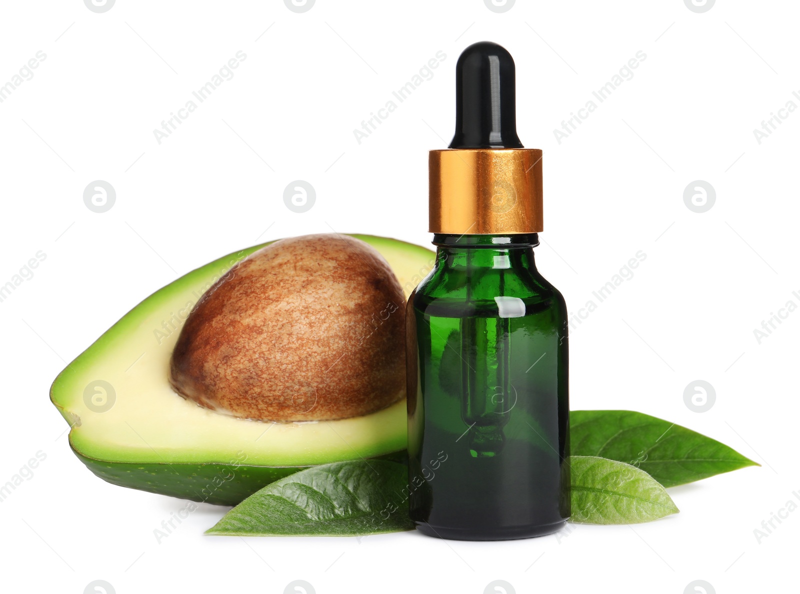 Photo of Bottle of essential oil, avocado and leaves on white background