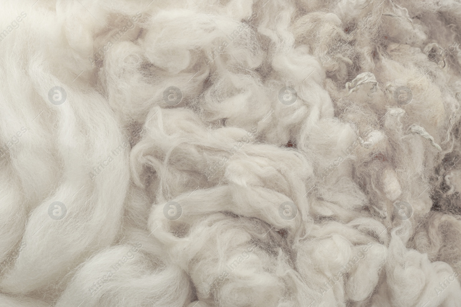 Photo of Soft white wool texture as background, closeup