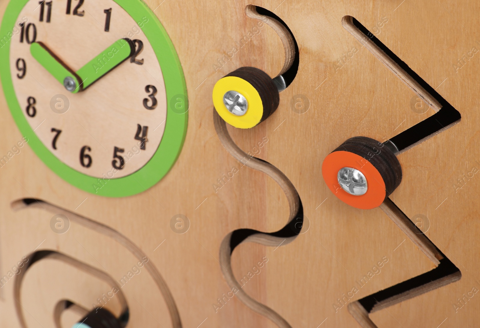 Photo of Closeup view of busy board. Baby sensory toy