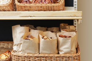 Showcase with different bakery products in store