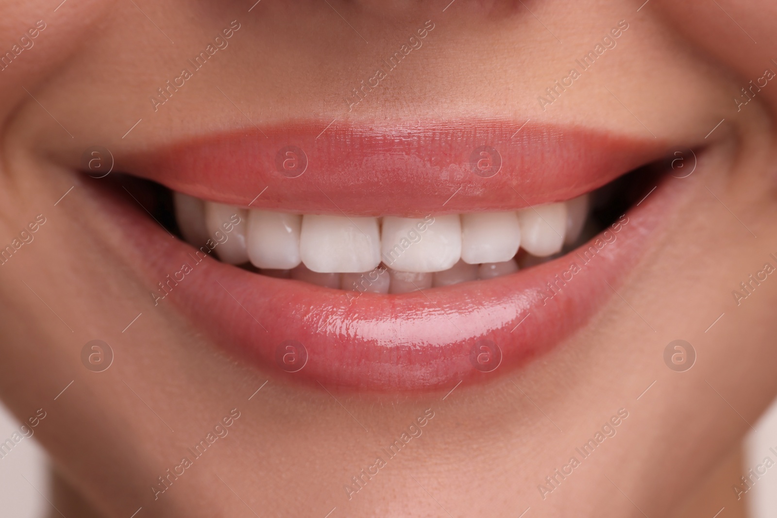 Photo of Woman with beautiful lips smiling, closeup view