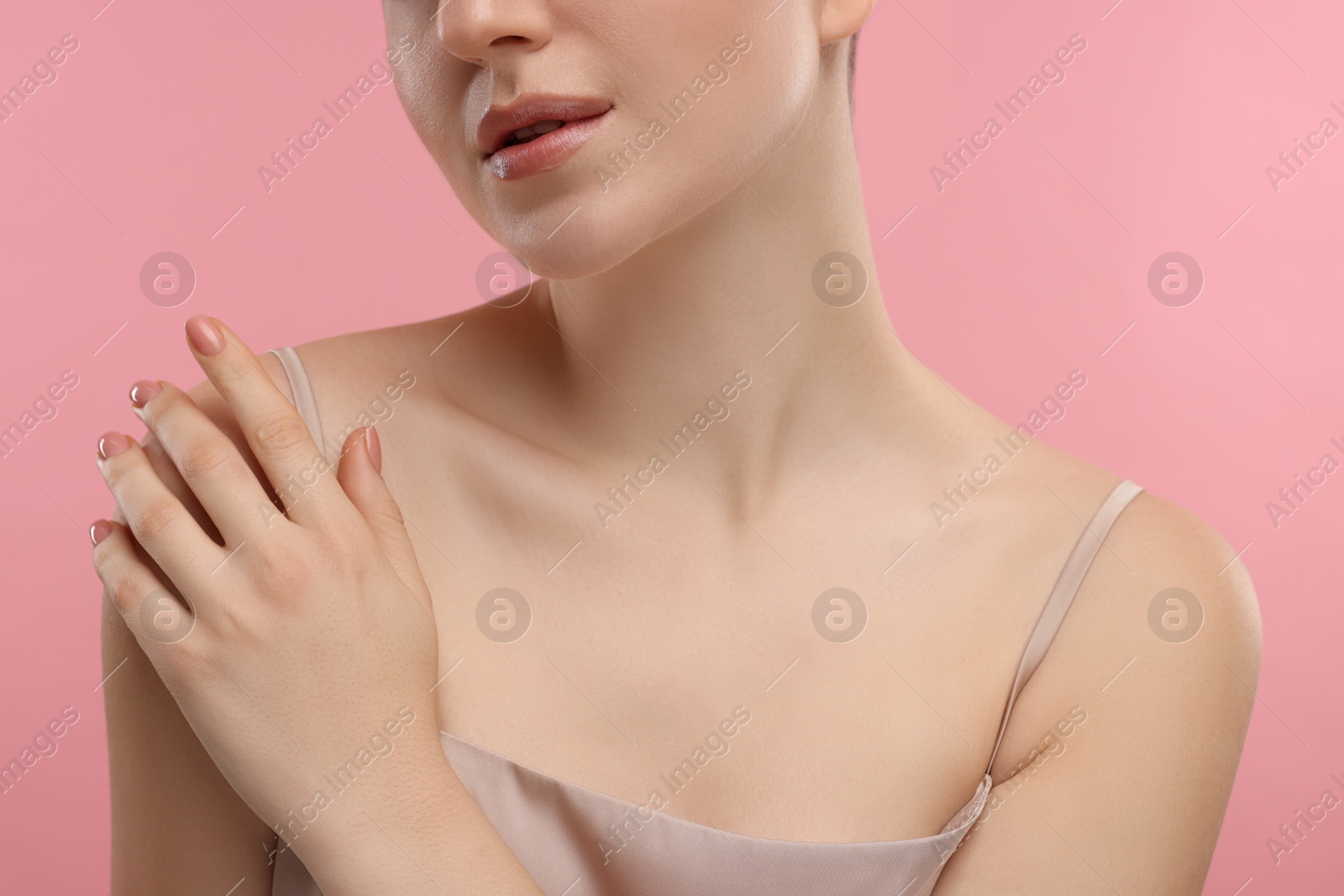 Photo of Beauty concept. Woman on pink background, closeup