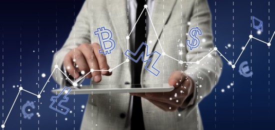 Image of Cryptocurrency, banner design. Businessman using tablet on blue background. Different currency symbols and graph