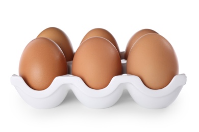 Photo of Tray with chicken eggs isolated on white