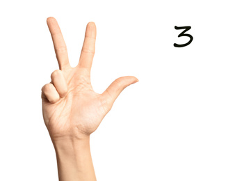 Woman showing number three on white background, closeup. Sign language