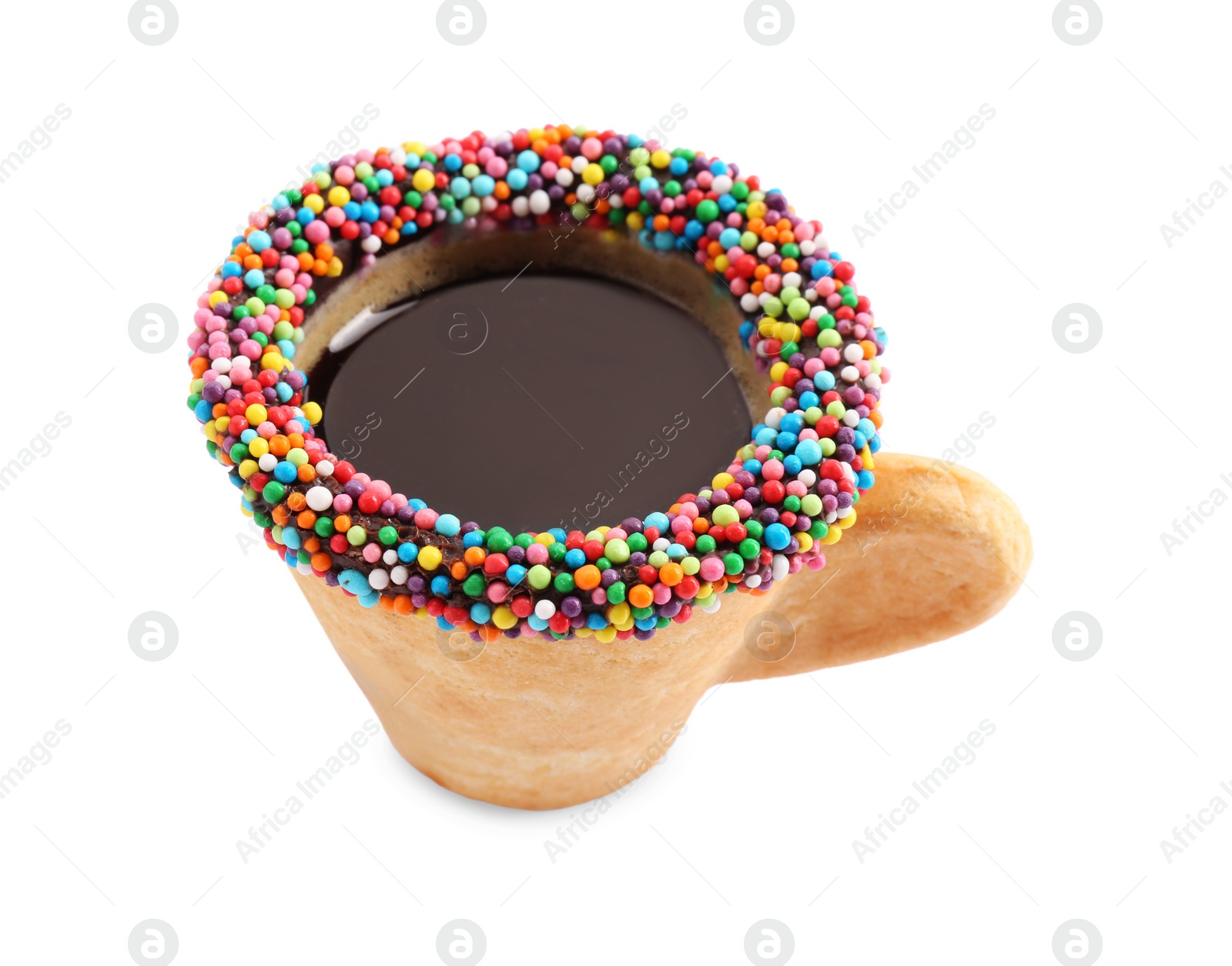 Photo of Delicious edible biscuit cup of coffee decorated with sprinkles isolated on white