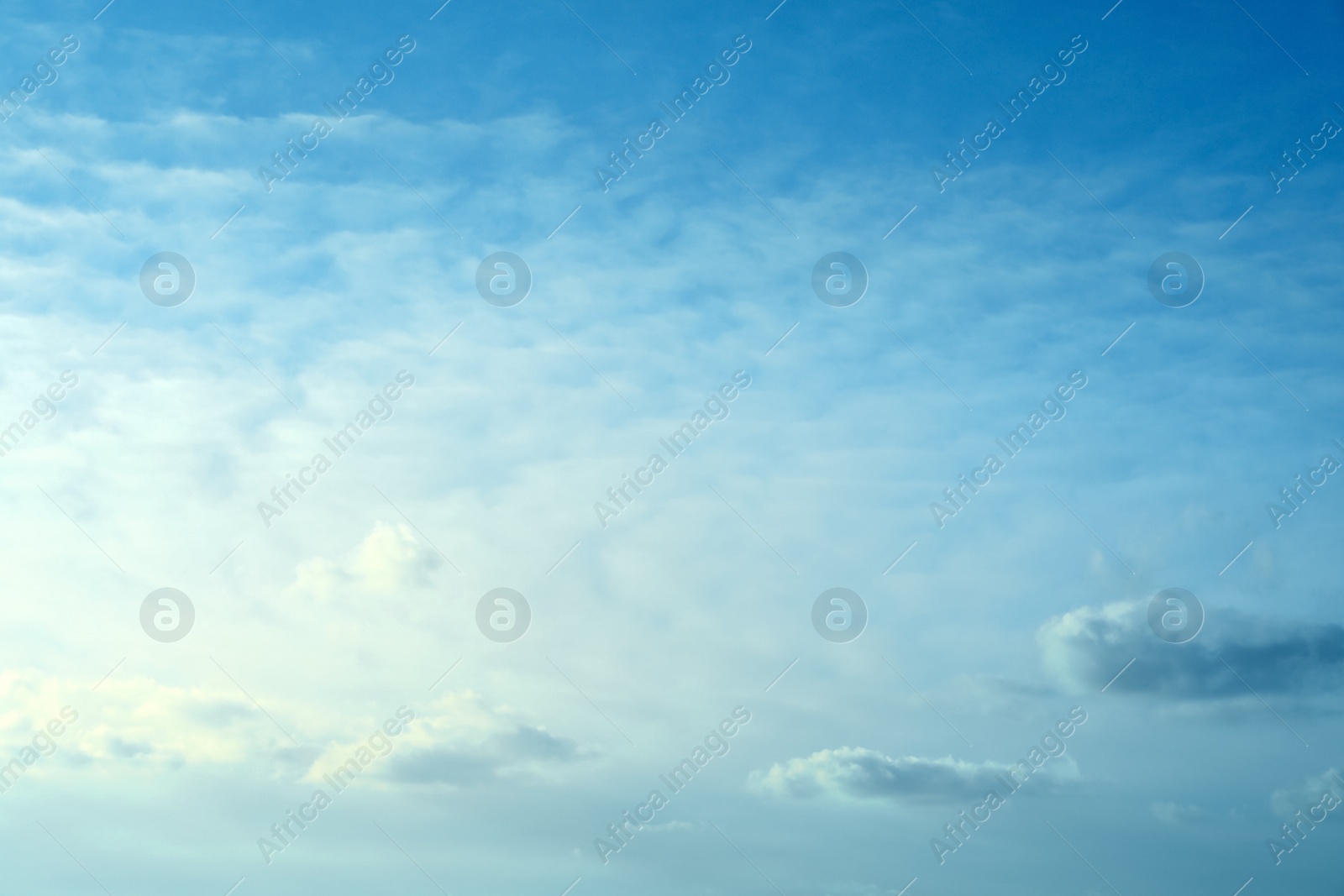 Photo of Beautiful light blue sky with fluffy clouds