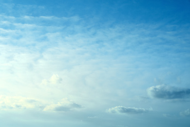 Photo of Beautiful light blue sky with fluffy clouds