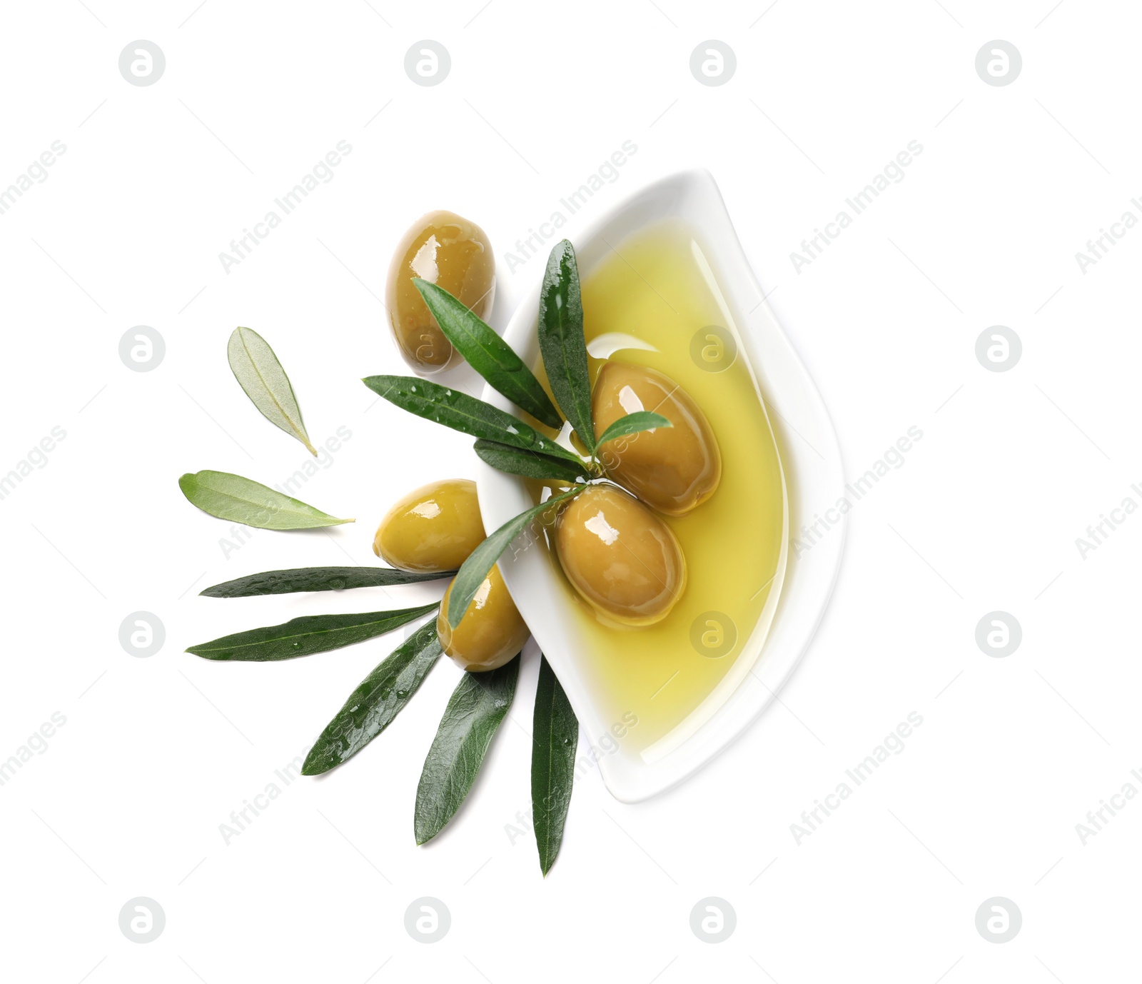 Photo of Dish with oil, olives and leaves on white background