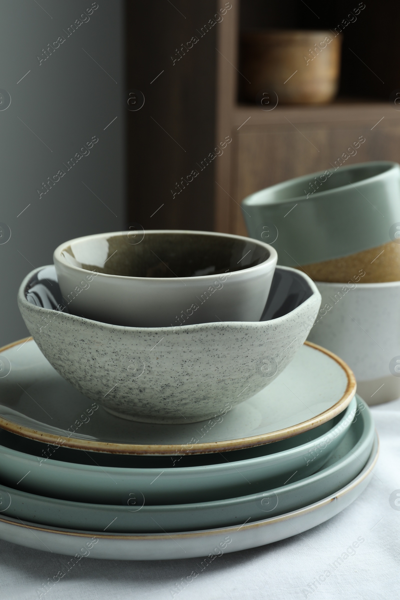 Photo of Stylish empty dishware on table indoors, closeup