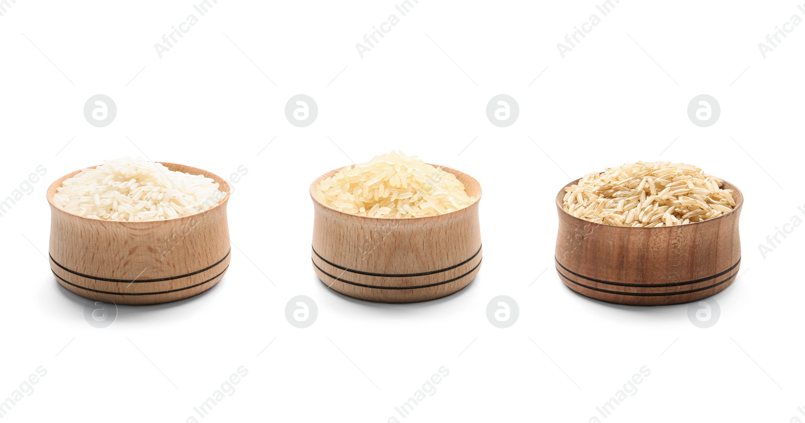 Photo of Bowls with different types of uncooked rice on white background