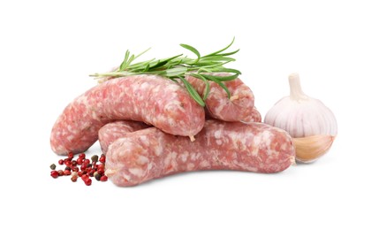 Raw homemade sausages and different spices isolated on white