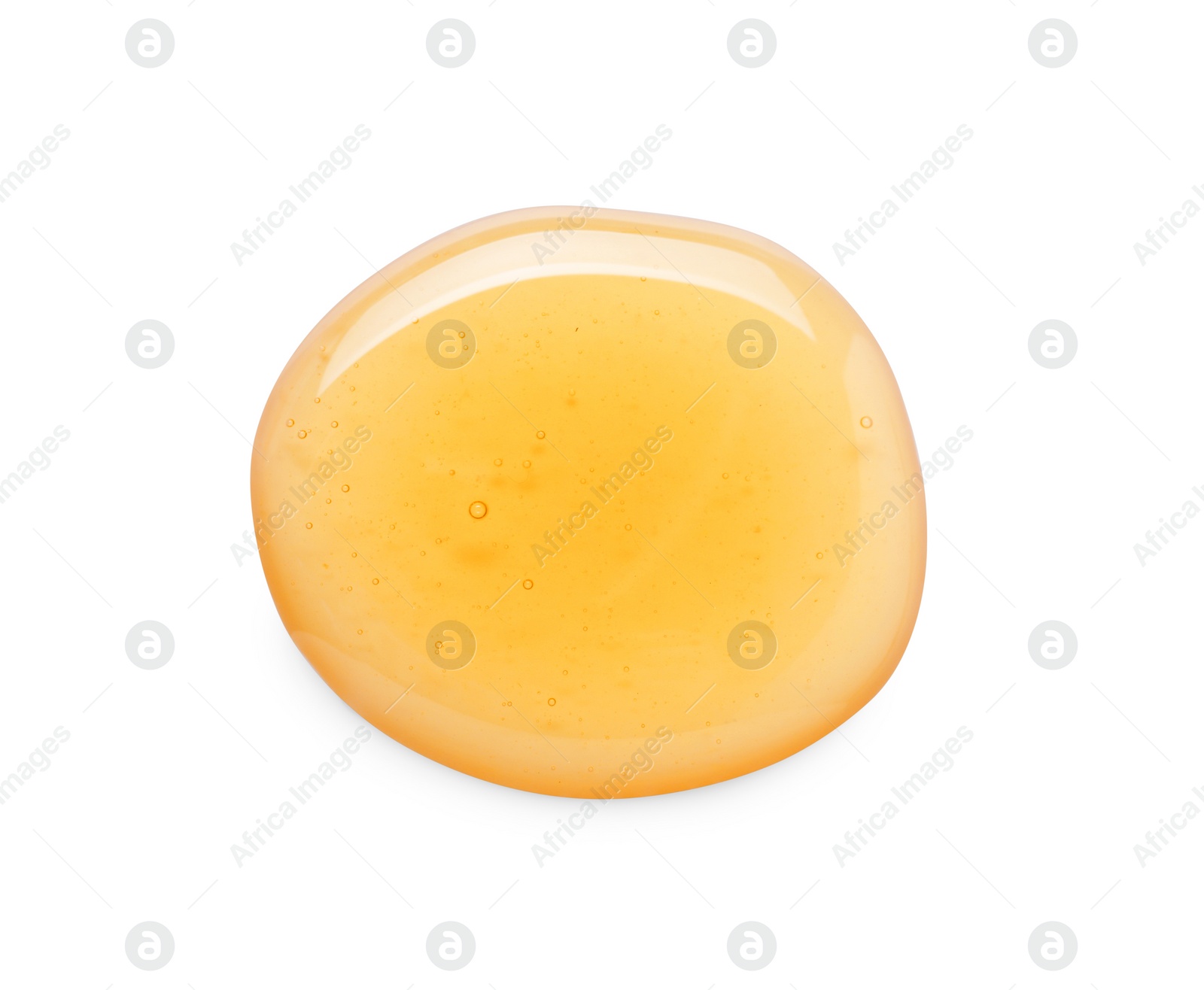 Photo of Drop of tasty natural honey isolated on white, top view