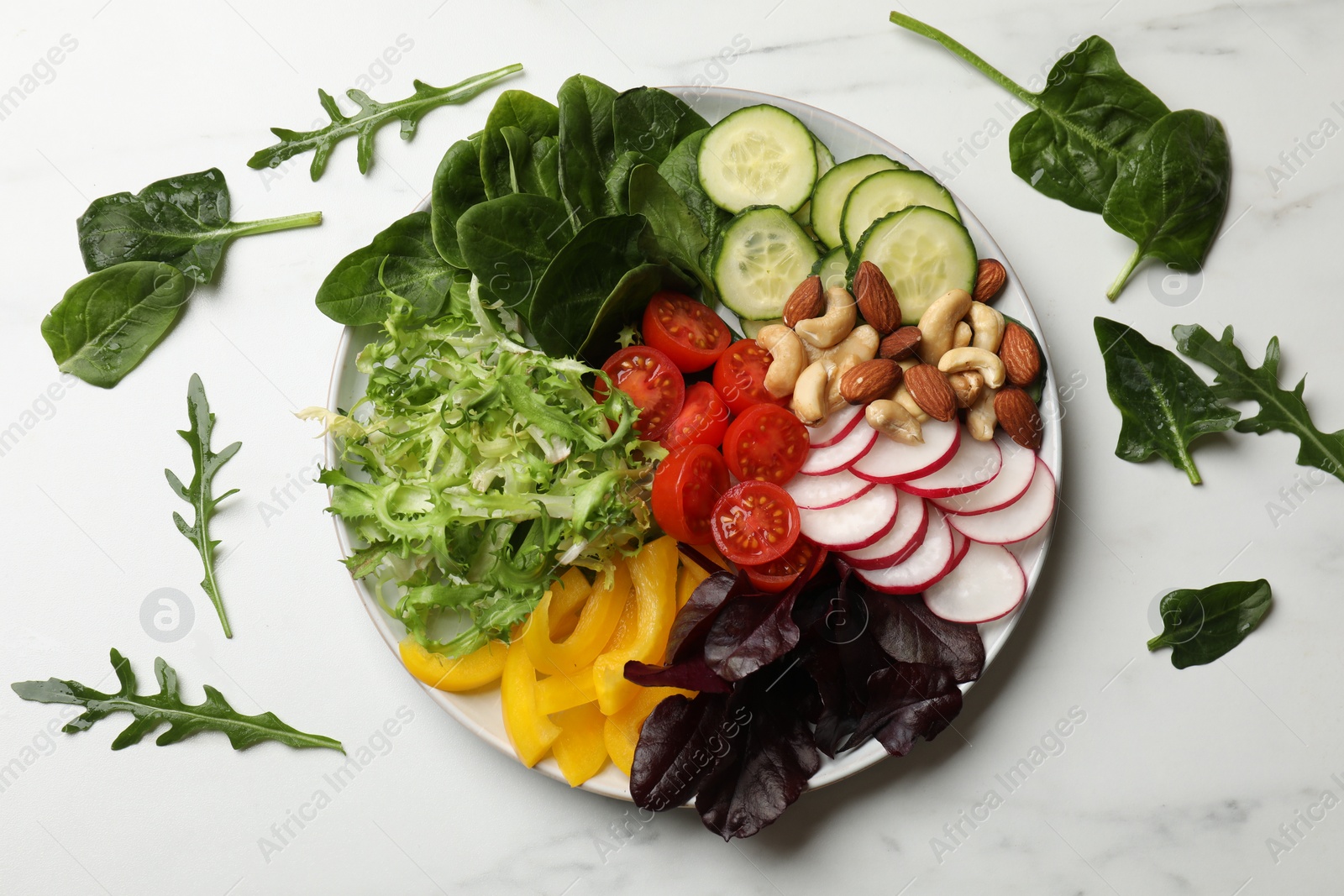 Photo of Balanced diet and vegetarian foods. Plate with different delicious products on white table, flat lay