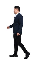 Photo of Businessman in suit walking on white background