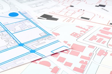 Many different cadastral maps as background, closeup