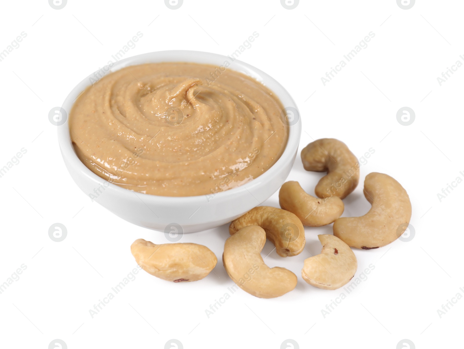 Photo of Delicious nut butter and cashews isolated on white