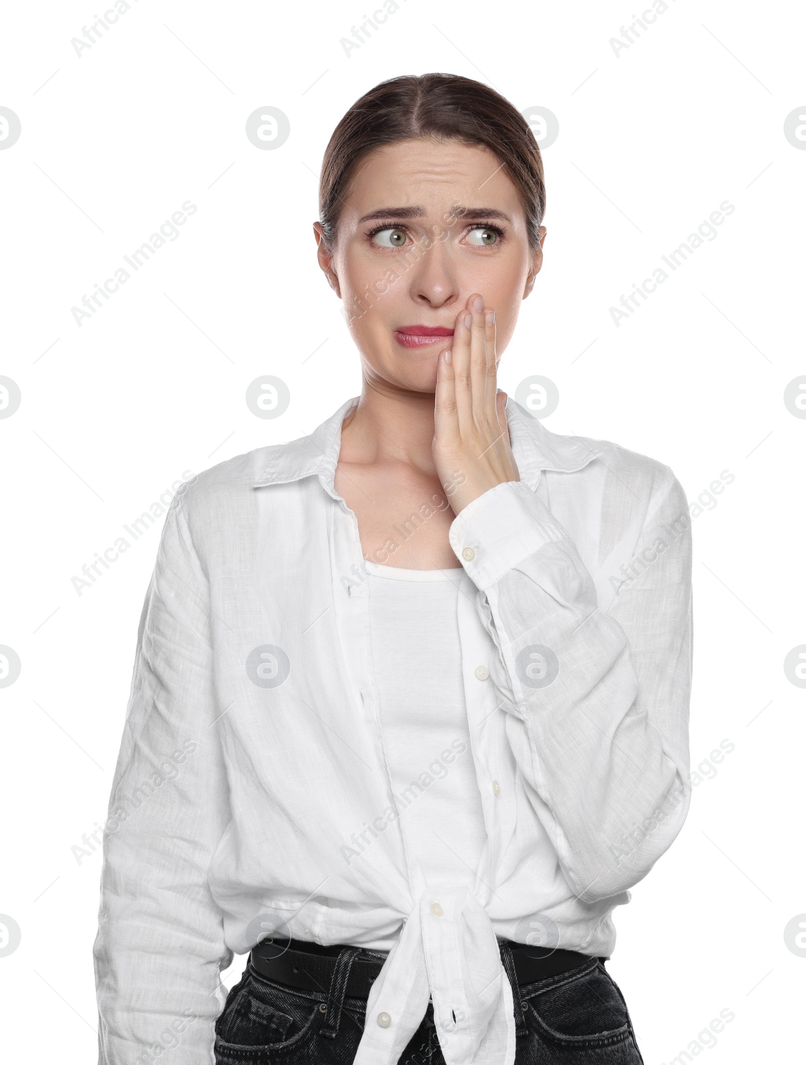 Photo of Embarrassed young woman in shirt on white background