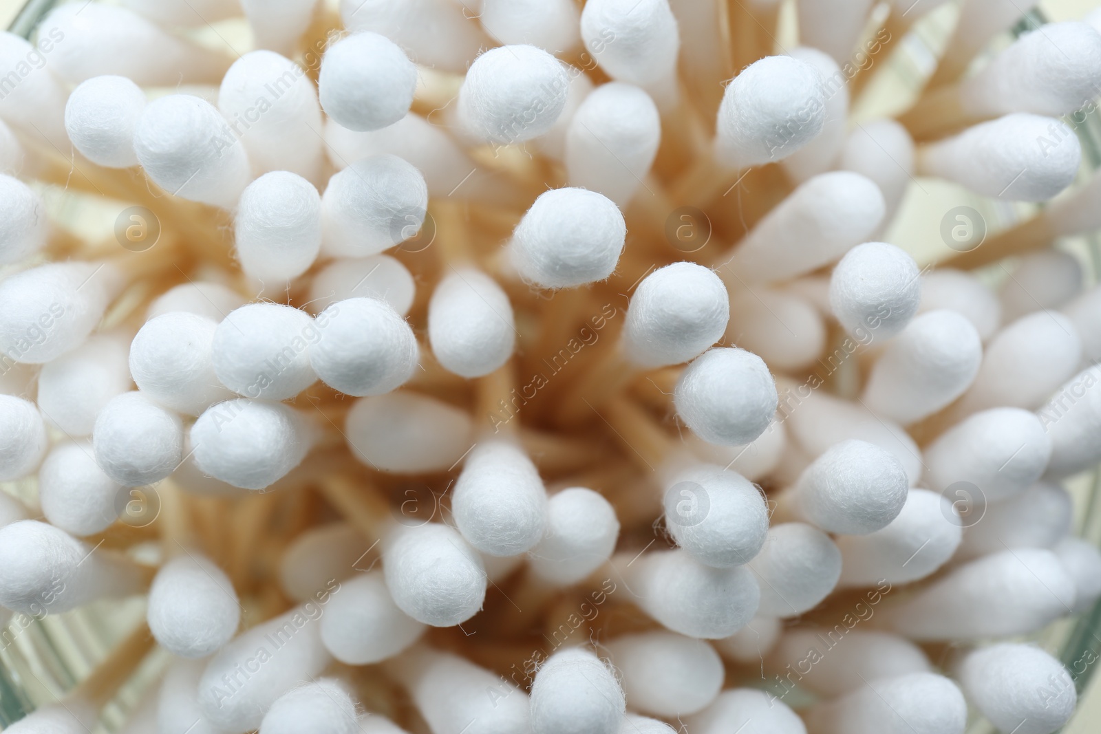 Photo of Many cotton buds as background, closeup view