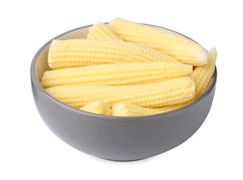 Photo of Tasty fresh yellow baby corn in bowl isolated on white