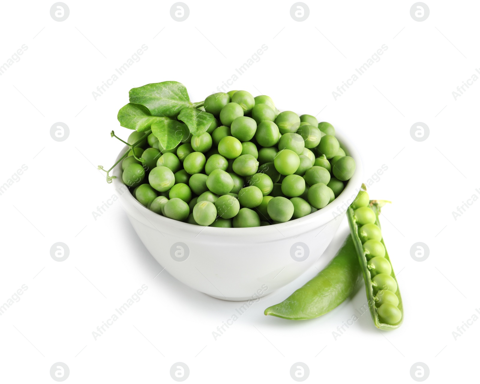 Photo of Bowl with delicious fresh green peas on white background