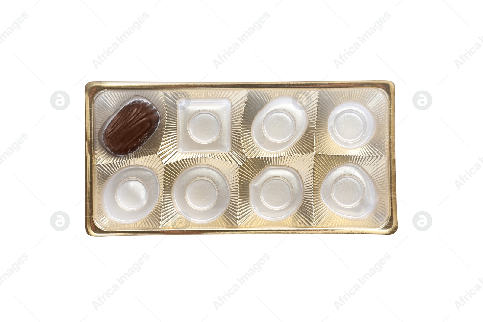 Photo of Partially empty box of chocolate candies isolated on white, top view