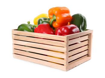 Photo of Wooden crate full of fresh ripe colorful bell peppers isolated on white