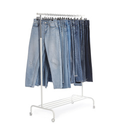 Rack with different jeans isolated on white