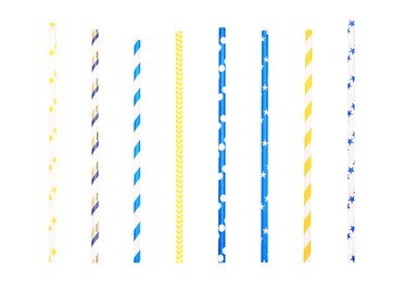 Set of colorful paper drinking straws on white background