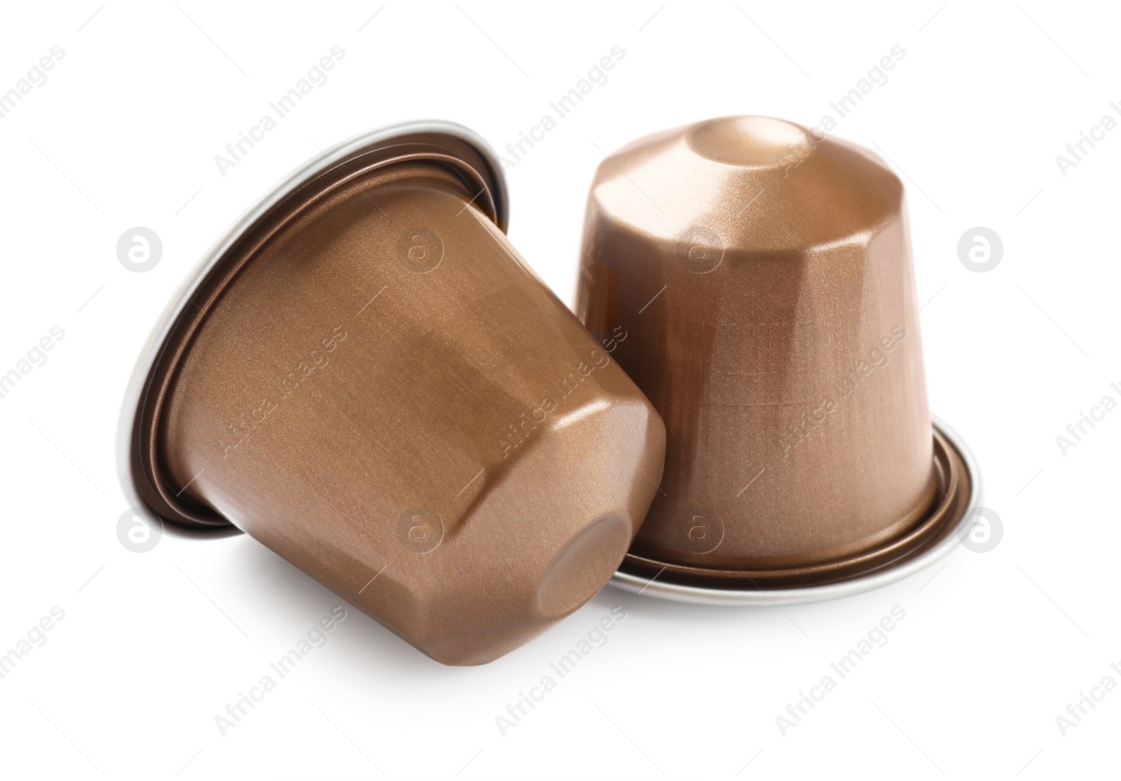 Photo of Two plastic coffee capsules isolated on white