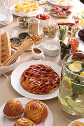 Photo of Variety of snacks on wooden table in buffet style