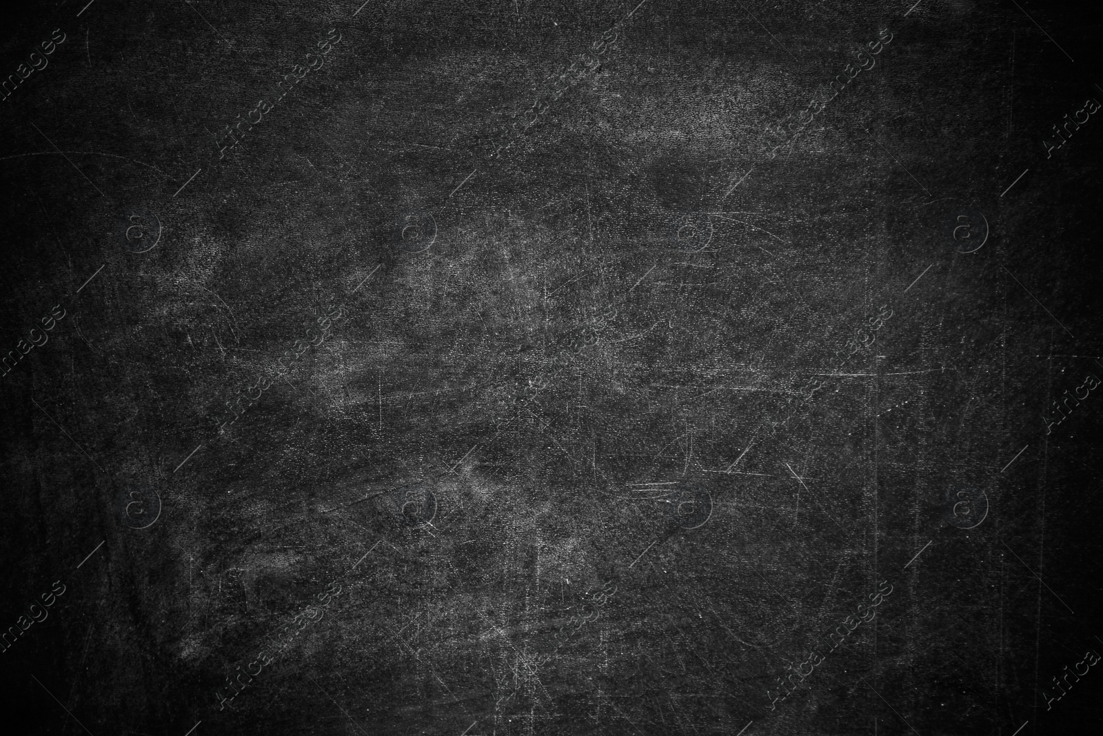 Photo of Dirty black chalkboard as background. Space for text