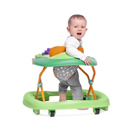 Photo of Cute little boy in baby walker on white background