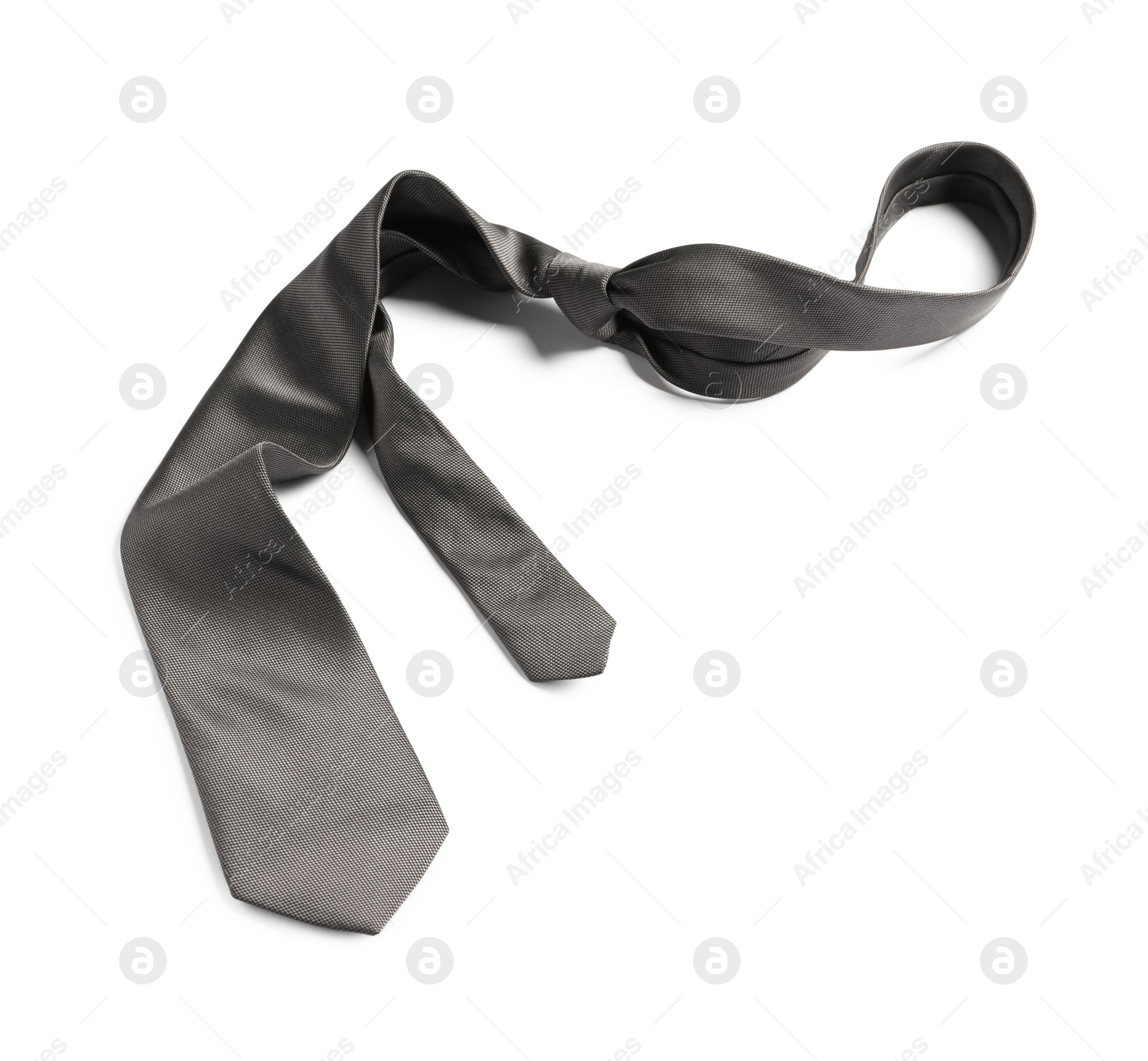 Photo of One grey necktie isolated on white, above view