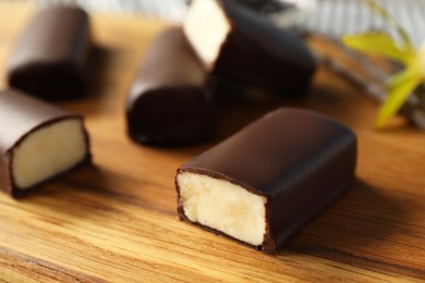 Photo of Glazed curd cheese bars on table, closeup