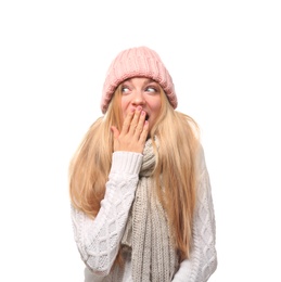 Photo of Portrait of emotional young woman in stylish hat and sweater with scarf on white background. Winter atmosphere