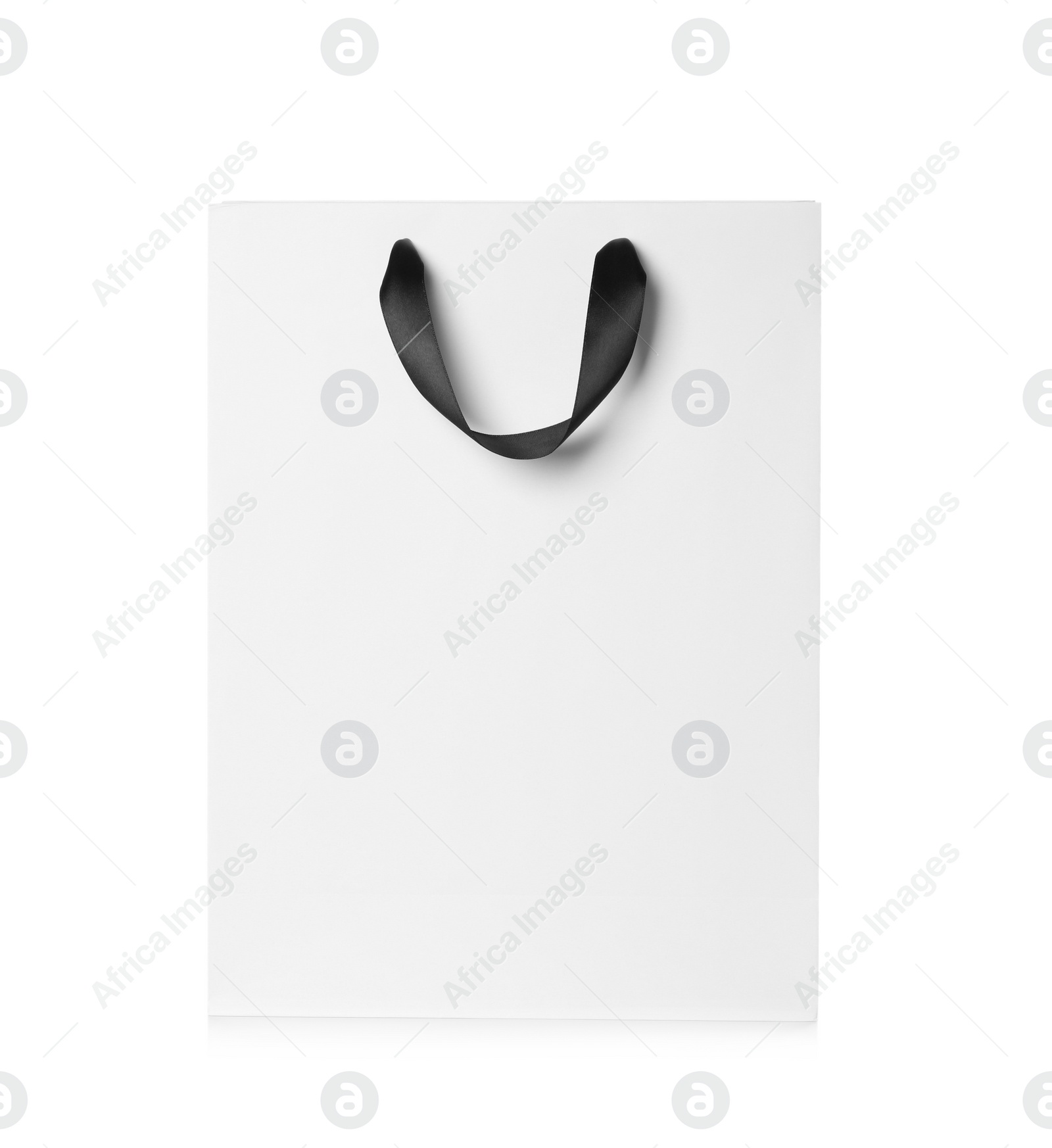 Photo of Paper shopping bag isolated on white. Mock up for design