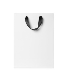 Photo of Paper shopping bag isolated on white. Mock up for design