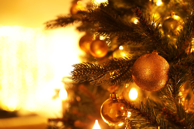 Closeup view of beautifully decorated Christmas tree indoors