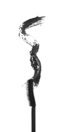 Photo of Applicator and black mascara smear on white background, top view