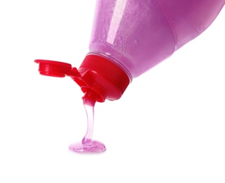 Photo of Pouring cleaning product for dish washing on white background, closeup