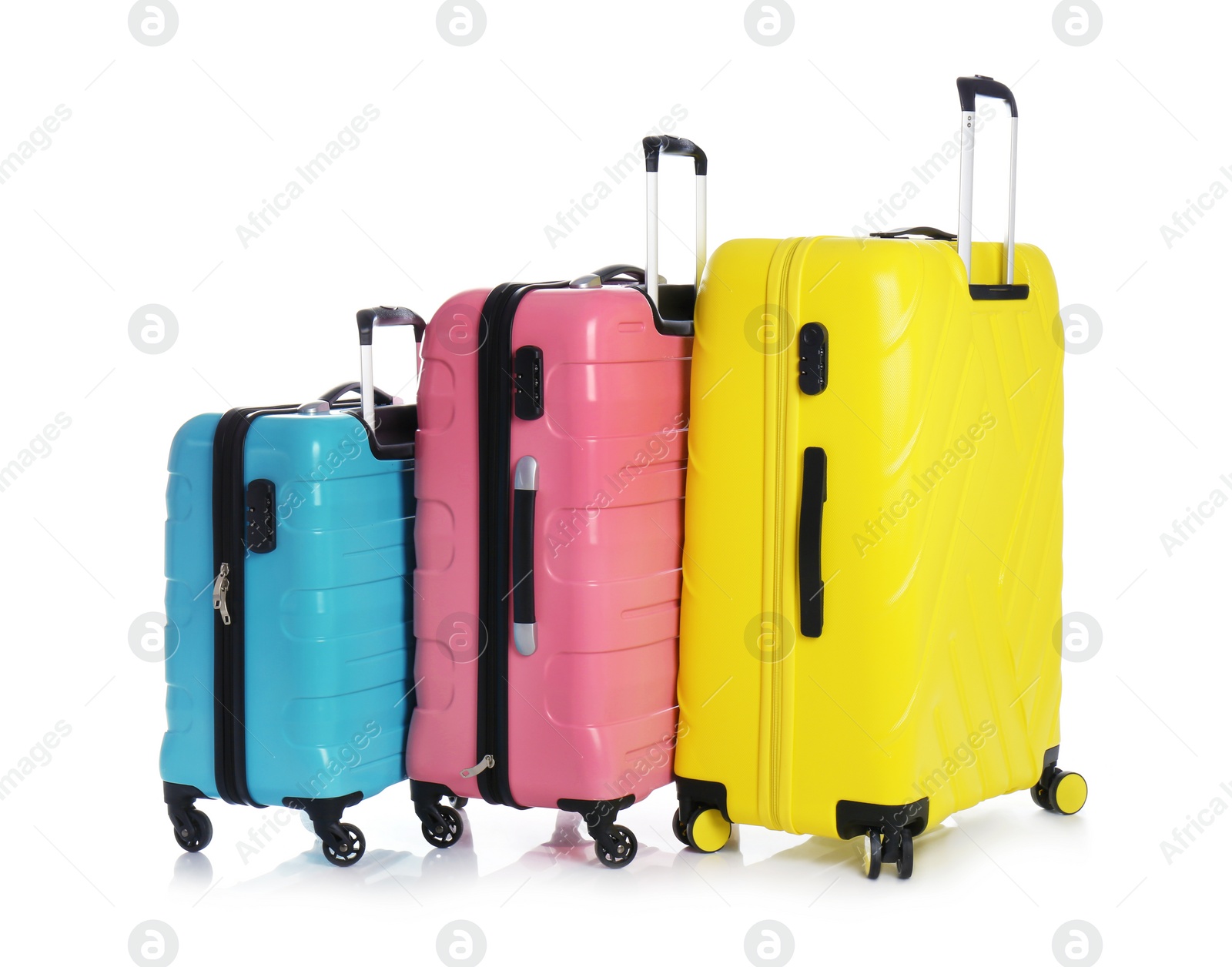 Photo of Modern suitcases for travelling on white background