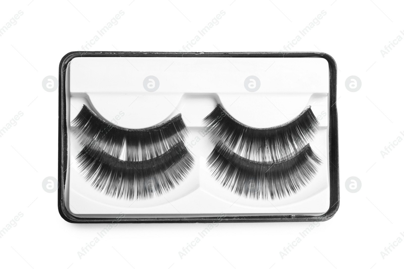 Photo of False eyelashes on white background