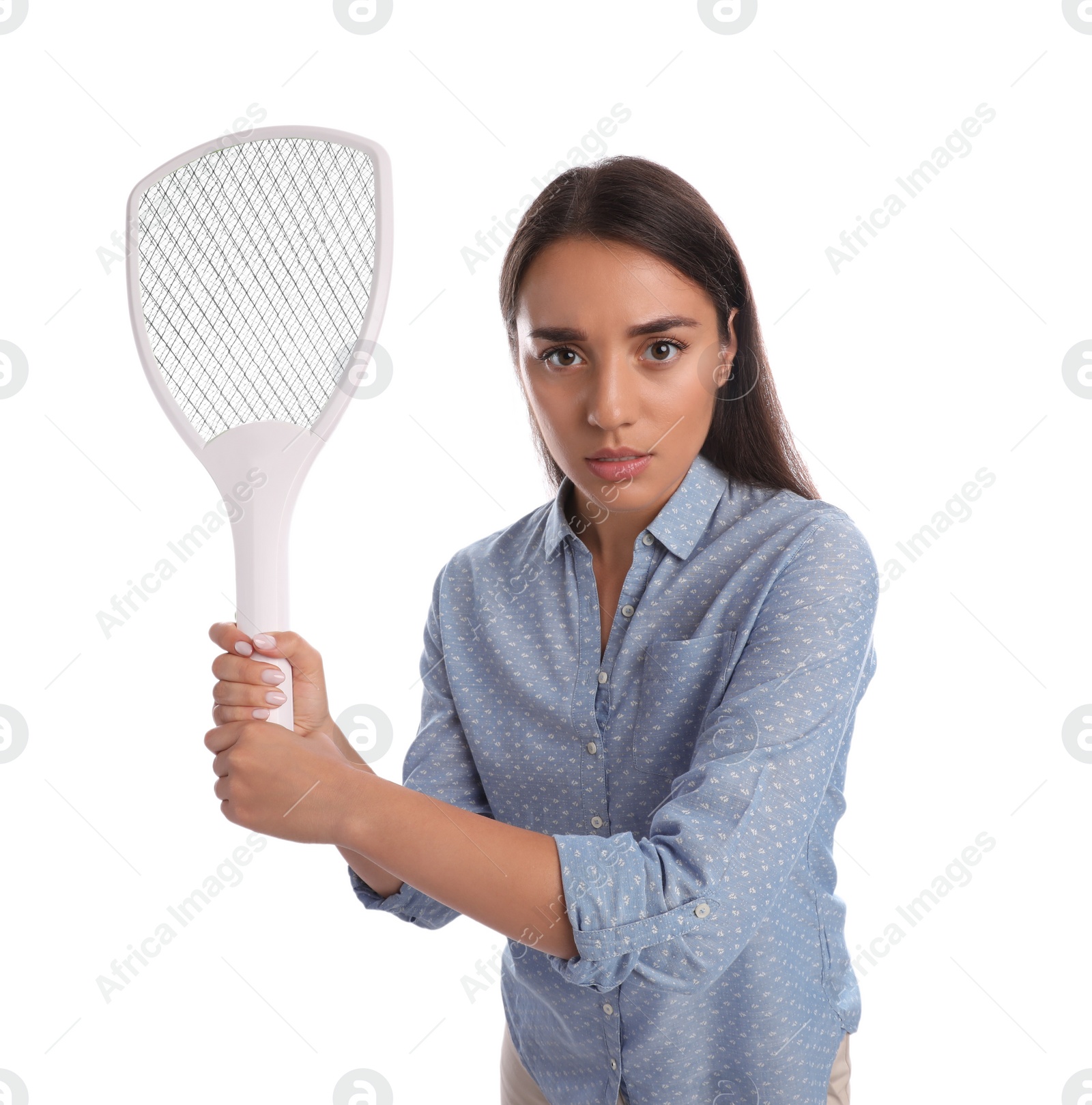 Photo of Young woman with electric fly swatter on white background. Insect killer