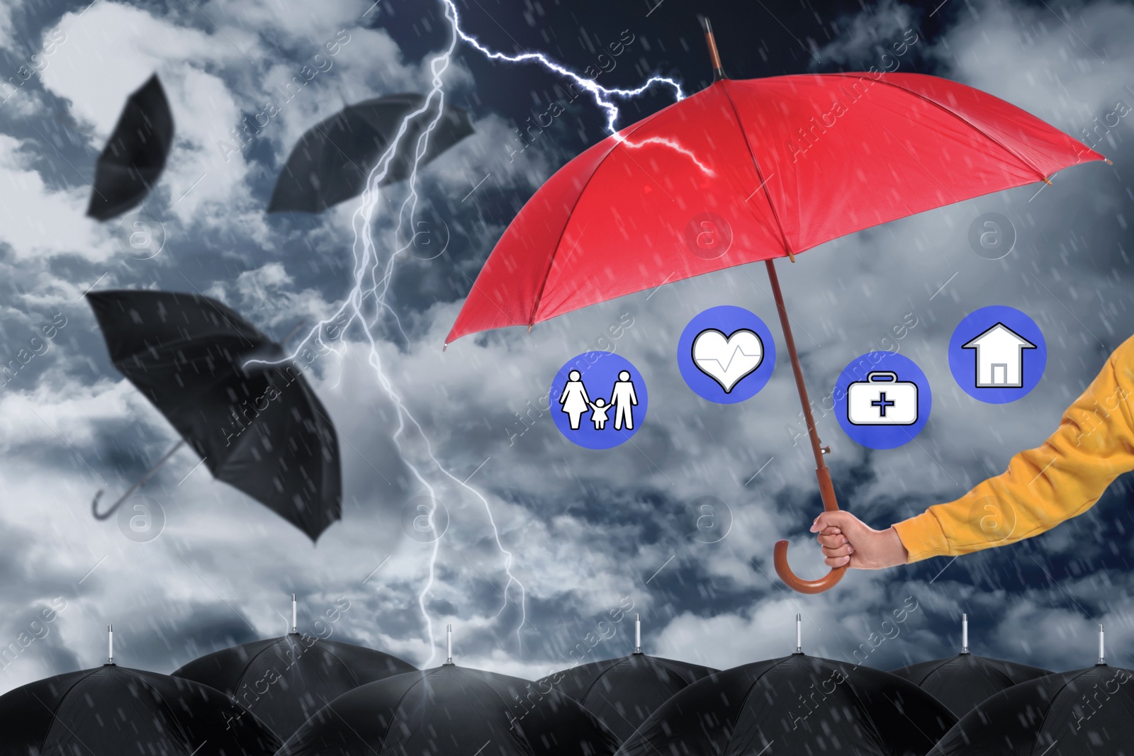 Image of Insurance agent covering illustrations with red umbrella during storm