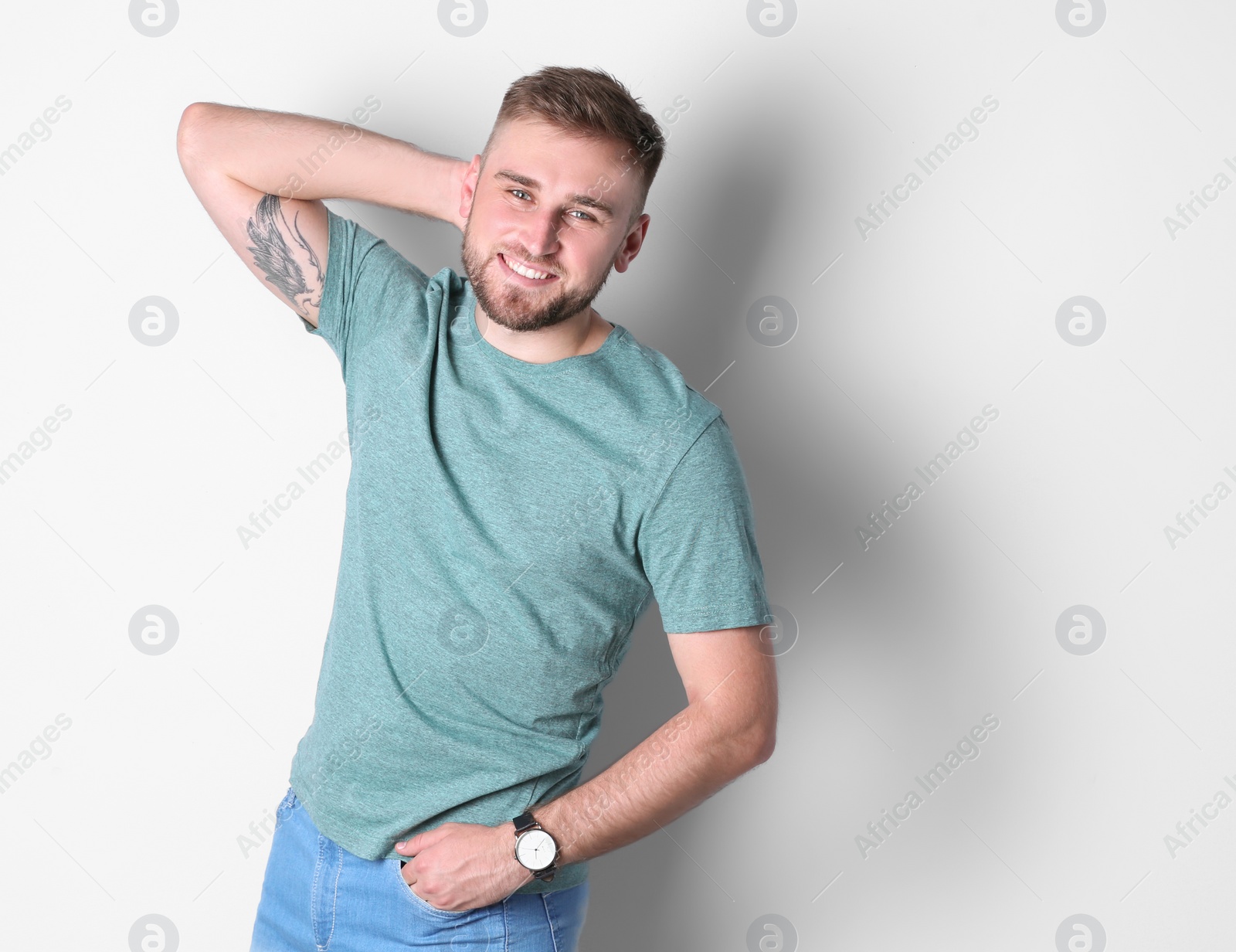 Photo of Portrait of handsome happy man on white background