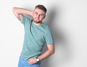 Portrait of handsome happy man on white background