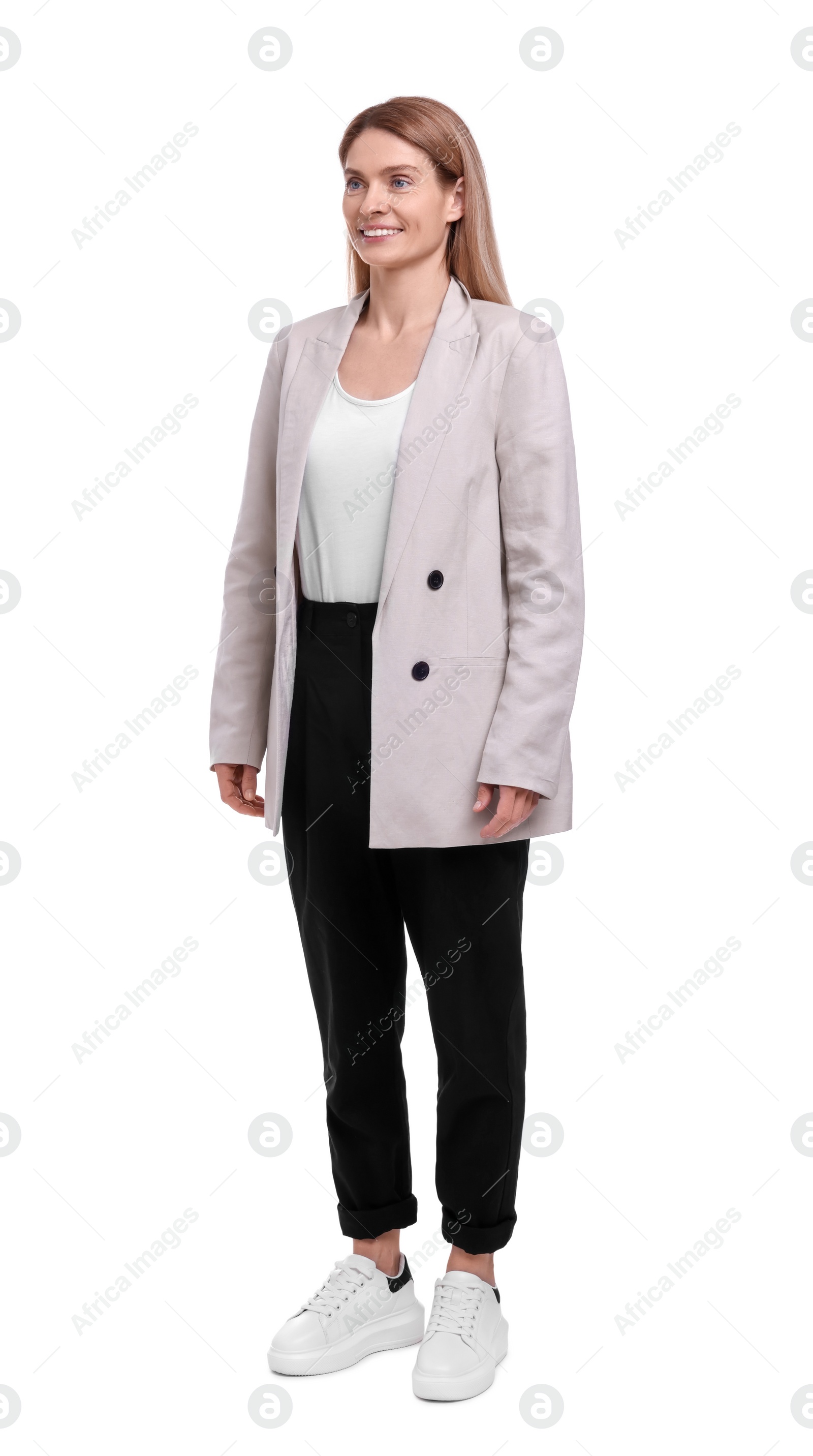 Photo of Beautiful happy businesswoman posing on white background